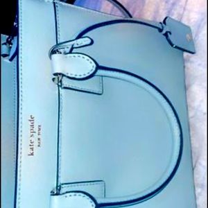 Kate spade teal purse .